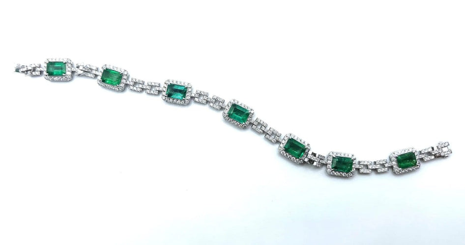 Bracelet Bracelet rivière en or gris, émeraudes et diamants 58 Facettes