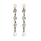 Boucles d'oreilles Pendants d’oreilles - Motifs floraux en or gris 18 carats, émeraudes et diamants 58 Facettes