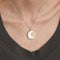 Pendentif Pendentif en or gris 18K avec nacre et diamants 58 Facettes HS2417