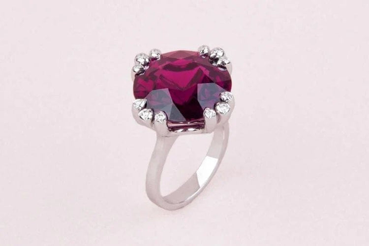 Bague 54 Bague en or gris au grenat violet 58 Facettes 248365