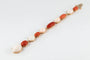 Bracelet Bracelet en or jaune aux coraux et diamants 58 Facettes 175328