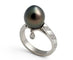 Bague 58 MEL'S - Bague en or gris avec perle noire et diamants 58 Facettes 042361