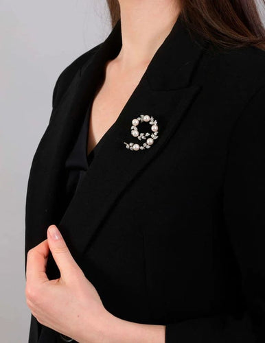 Broche Broche perles de culture et diamants taille ancienne en or blanc 58 Facettes 258843