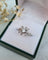 Bague 50 Bague fleur vintage en or gris 18 carats 58 Facettes 282