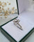 Bague 50 Bague fleur vintage en or gris 18 carats 58 Facettes 282