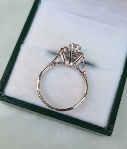 Bague 50 Bague fleur vintage en or gris 18 carats 58 Facettes 282