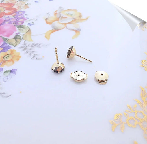 Boucles d'oreilles Boucles d’oreilles puces en or jaune 18 K et quartz fumé 58 Facettes AA 1526