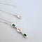Collier Collier ras-du-cou - Pendentif en or blanc 18 carats, diamants et grenats verts 58 Facettes AA 1725