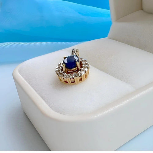 Pendentif Pendentif en or jaune et blanc 18 carats, saphir et diamants 58 Facettes 1749