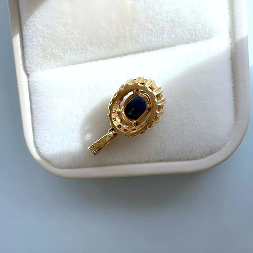 Pendentif Pendentif en or jaune et blanc 18 carats, saphir et diamants 58 Facettes 1749