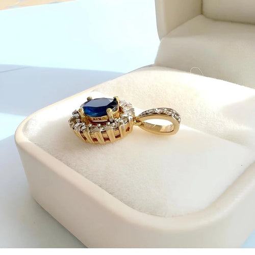 Pendentif Pendentif en or jaune et blanc 18 carats, saphir et diamants 58 Facettes 1749