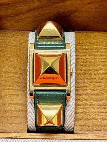Montre Hermès Médor - Montre en plaqué or, cuir vert 58 Facettes WC-2025-1884