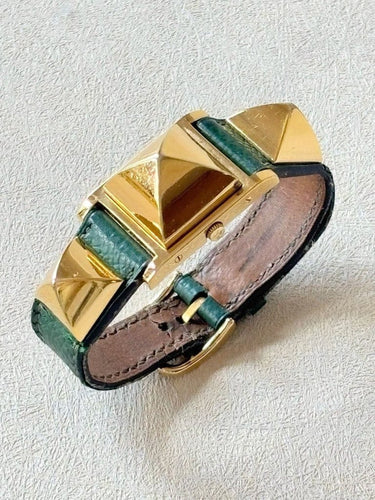 Montre Hermès Médor - Montre en plaqué or, cuir vert 58 Facettes WC-2025-1884