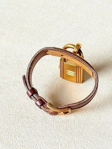 Montre Hermès Kelly - Montre à quartz avec bracelet cuir marron 58 Facettes WC-2025-1813