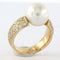 Bague 55 Bague en or jaune 18 carats avec perle et diamants 58 Facettes