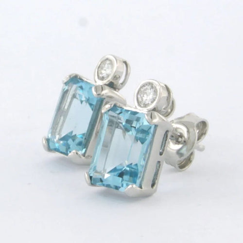 Boucles d'oreilles Boucles d’oreilles puces en or blanc 14 carats avec topazes et diamants 58 Facettes