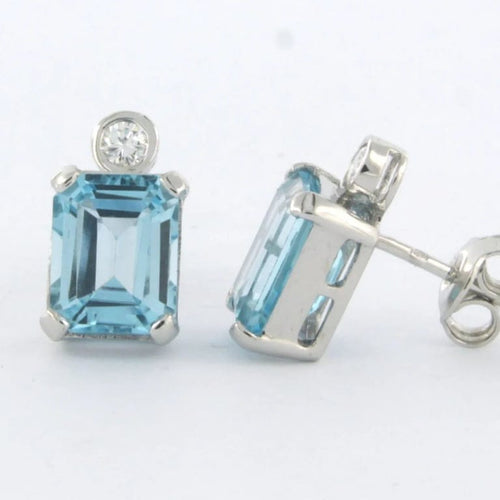 Boucles d'oreilles Boucles d’oreilles puces en or blanc 14 carats avec topazes et diamants 58 Facettes