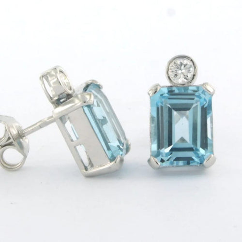 Boucles d'oreilles Boucles d’oreilles puces en or blanc 14 carats avec topazes et diamants 58 Facettes
