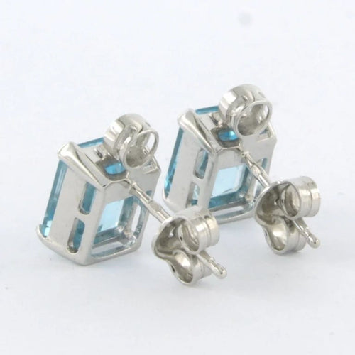 Boucles d'oreilles Boucles d’oreilles puces en or blanc 14 carats avec topazes et diamants 58 Facettes