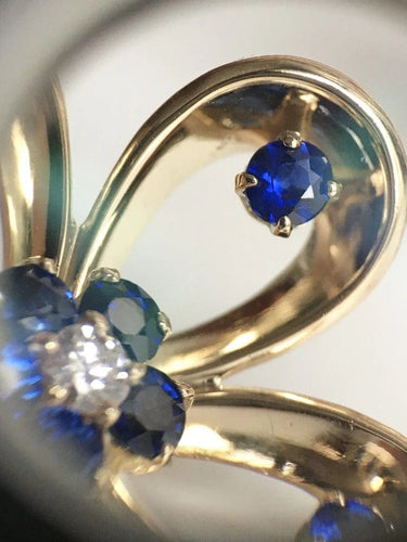 Boucles d'oreilles Boucles d’oreilles fleurs en or jaune 14 carats, saphirs et diamants 58 Facettes