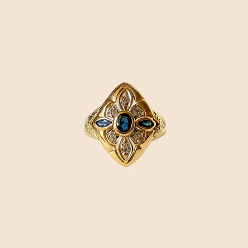 Bague 57 Bague navette en or jaune et or gris 18 carats, saphirs et diamants 58 Facettes