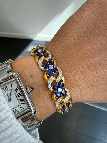 Bracelet Bracelet en or jaune 22 carats serti de saphirs et diamants 58 Facettes 1.0002546/1