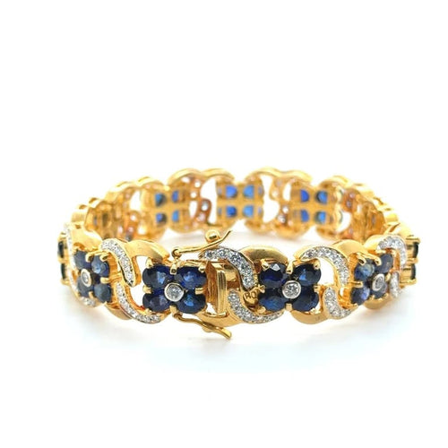Bracelet Bracelet en or jaune 22 carats serti de saphirs et diamants 58 Facettes 1.0002546/1