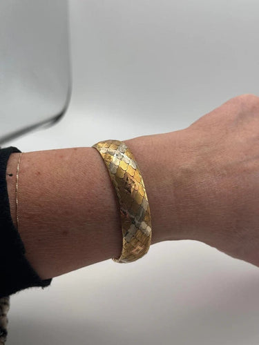 Bracelet Bracelet tapis vintage en or 18 carats tricolore 58 Facettes