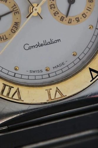 Montre Omega Constellation Day-Date - Montre en or jaune 18 ct et acier 58 Facettes
