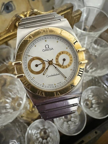 Montre Omega Constellation Day-Date - Montre en or jaune 18 ct et acier 58 Facettes