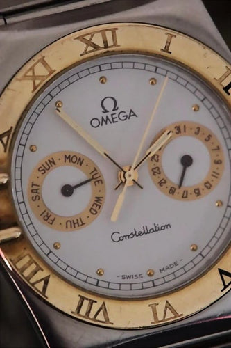 Montre Omega Constellation Day-Date - Montre en or jaune 18 ct et acier 58 Facettes