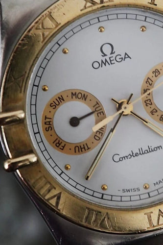 Montre Omega Constellation Day-Date - Montre en or jaune 18 ct et acier 58 Facettes