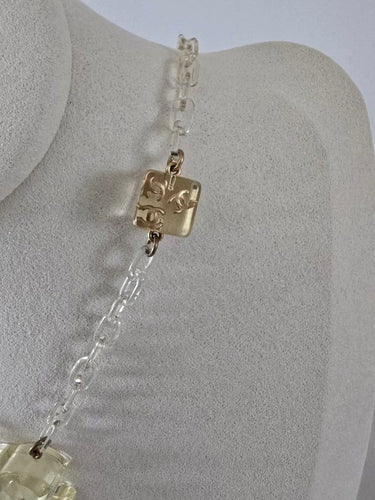 Collier Chanel Ice Cube - Collier vintage en métal doré et résine 58 Facettes