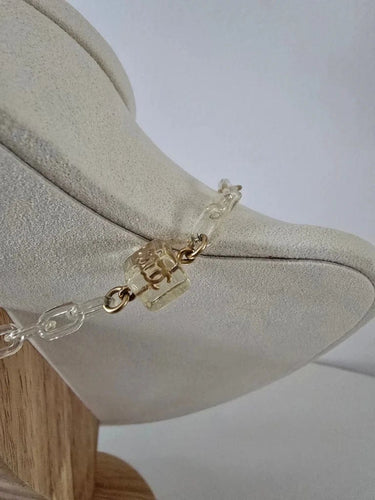 Collier Chanel Ice Cube - Collier vintage en métal doré et résine 58 Facettes