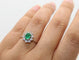 Bague Bague marguerite en or gris 18K à émeraude et diamants 58 Facettes