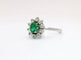 Bague Bague marguerite en or gris 18K à émeraude et diamants 58 Facettes