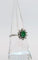 Bague Bague marguerite en or gris 18K à émeraude et diamants 58 Facettes
