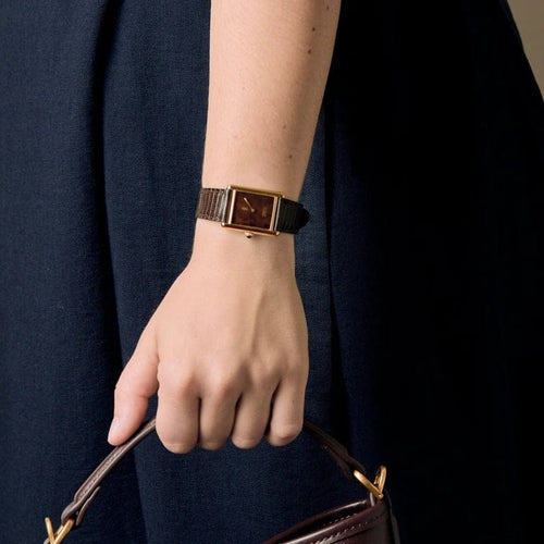 Montre Cartier Tank Must - Montre en argent plaqué or, cadran laqué marron « Bois » 58 Facettes