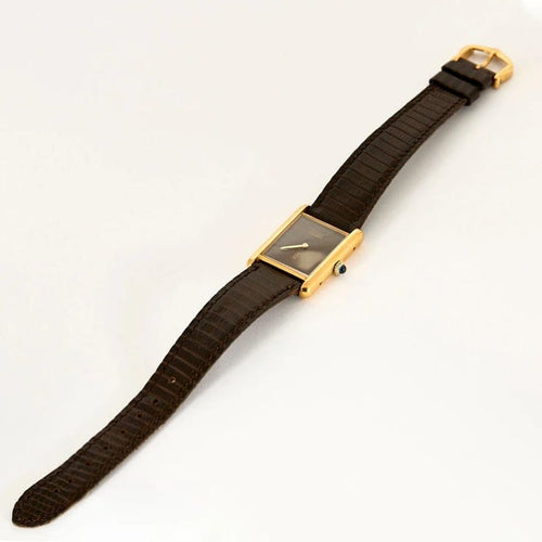 Montre Cartier Tank Must - Montre en argent plaqué or, cadran laqué marron « Bois » 58 Facettes