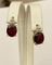Boucles d'oreilles Boucles d’oreilles puces en or blanc 18 carats, rubis et diamants 58 Facettes