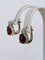 Boucles d'oreilles Boucles d’oreilles puces en or blanc 18 carats, rubis et diamants 58 Facettes