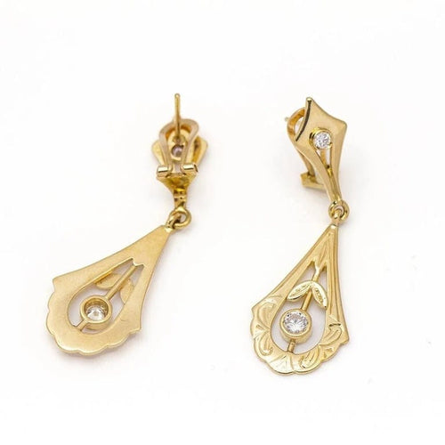 Boucles d'oreilles Boucles d’oreilles vintage en or jaune 18 carats et diamants 58 Facettes D359876JC