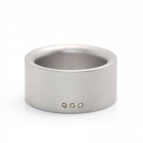 Bague 53 Niessing - Bague en acier sablé et diamants champagne 58 Facettes D359993JC