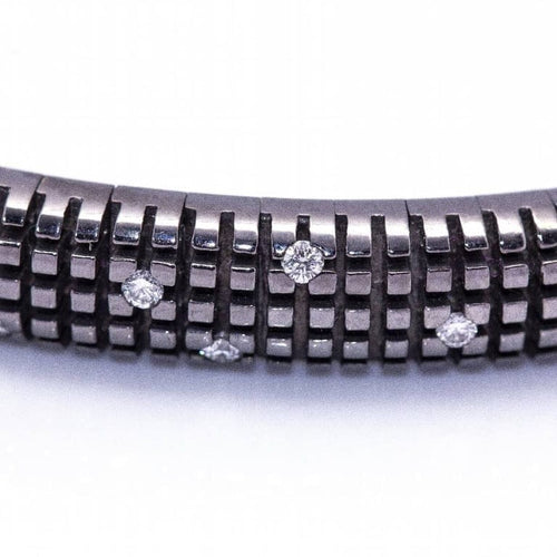 Bracelet Damiani - Bracelet en or blanc rhodié noir 18 kt et diamants 58 Facettes D360374CS