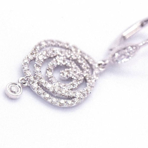 Boucles d'oreilles MONAKAL - Boucles d'oreilles en or blanc 18 carats et diamants 58 Facettes D360395CS