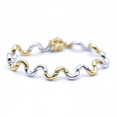 Bracelet Bracelet Waves bicolore en or jaune 18 ct et or blanc 58 Facettes N102867LF