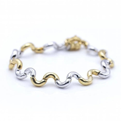 Bracelet Bracelet Waves bicolore en or jaune 18 ct et or blanc 58 Facettes N102867LF