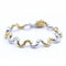 Bracelet Bracelet Waves bicolore en or jaune 18 ct et or blanc 58 Facettes N102867LF
