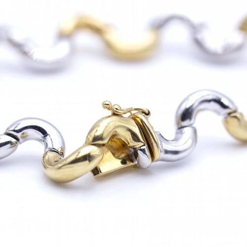 Bracelet Bracelet Waves bicolore en or jaune 18 ct et or blanc 58 Facettes N102867LF