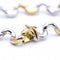 Bracelet Bracelet Waves bicolore en or jaune 18 ct et or blanc 58 Facettes N102867LF